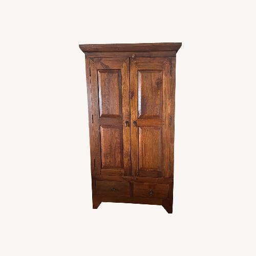 Used Solid Wood Armoire Wardrobe Media Center  for sale on AptDeco