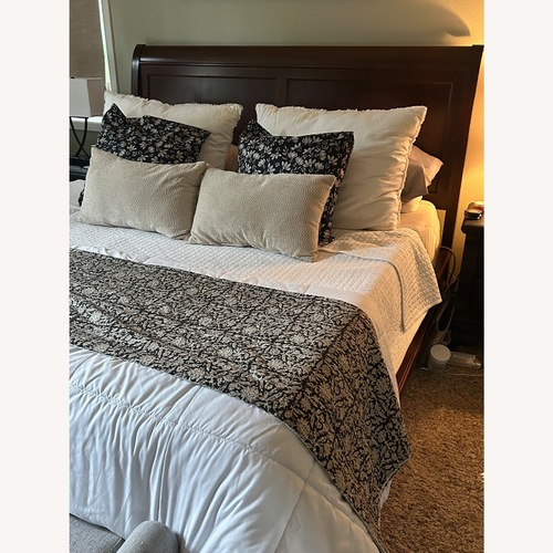 Used Solid Wood King Bed Frame for sale on AptDeco