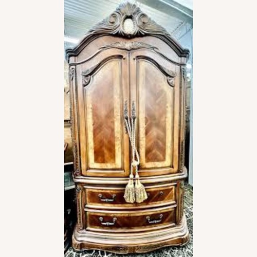 Used Michael Amini Cortina Armoire  for sale on AptDeco