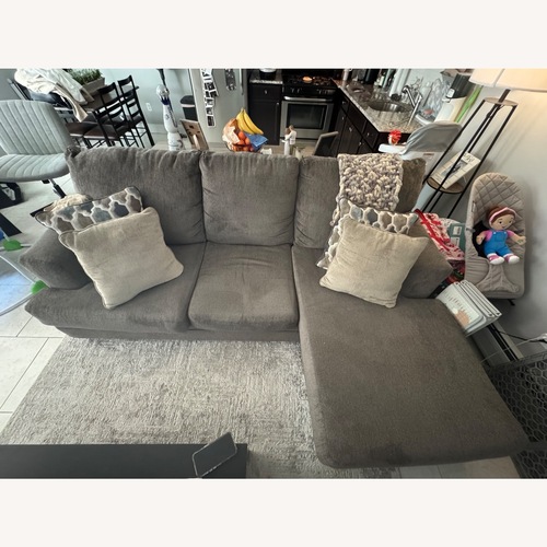 Used Ashley Furniture Small Sofa with Chaise for sale on AptDeco
