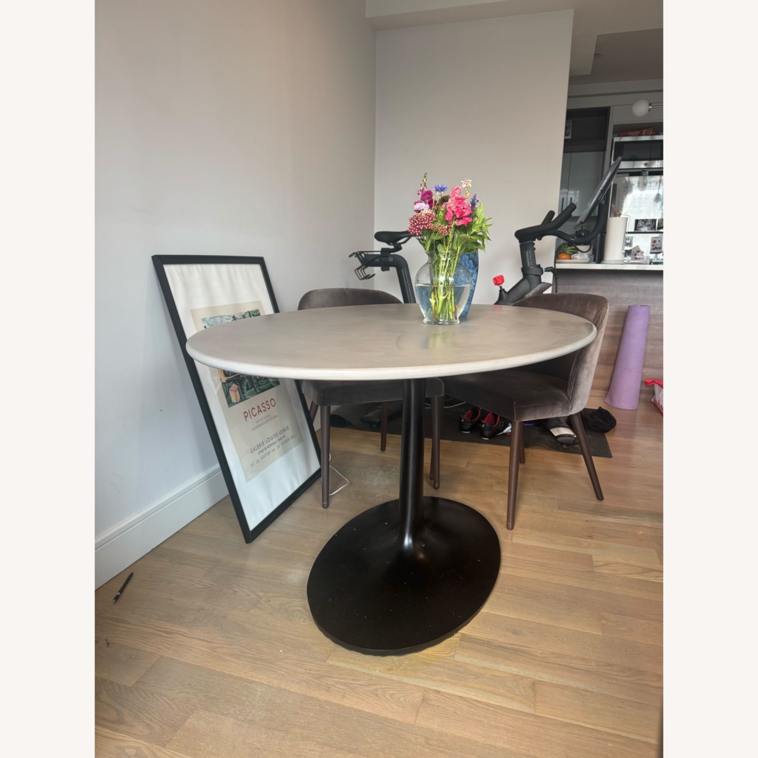 Crate & Barrel Nero 48" Round Concrete Dining Table with Matte Black Base - image-1