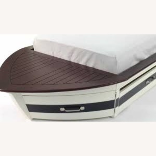 Used Pottery Barn Kids Speedboat Bed  for sale on AptDeco