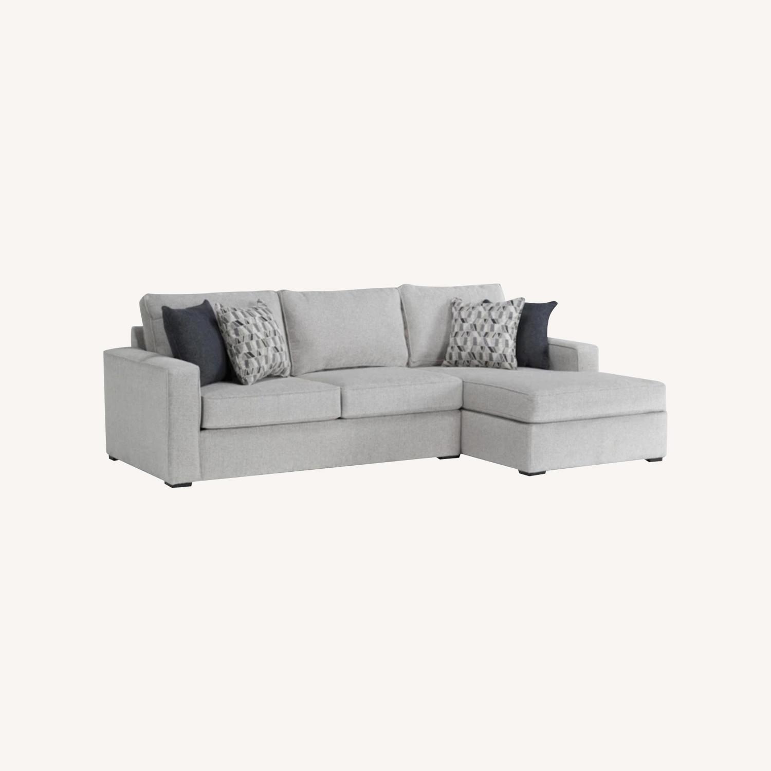 Living Spaces Light Gray Sectional - image-0