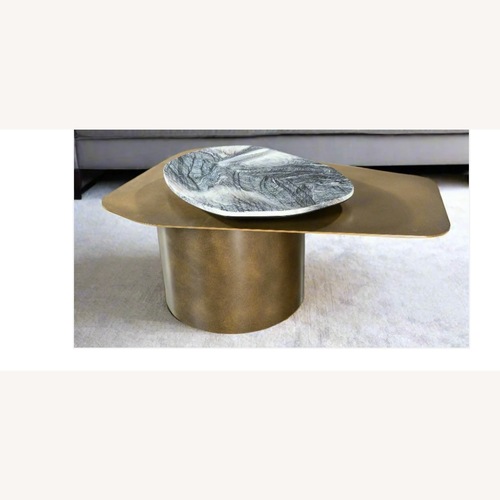 Used Statements by J irregular Narble Table  for sale on AptDeco