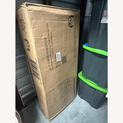 Used Target Dark Brown Wood Dining Set for sale on AptDeco