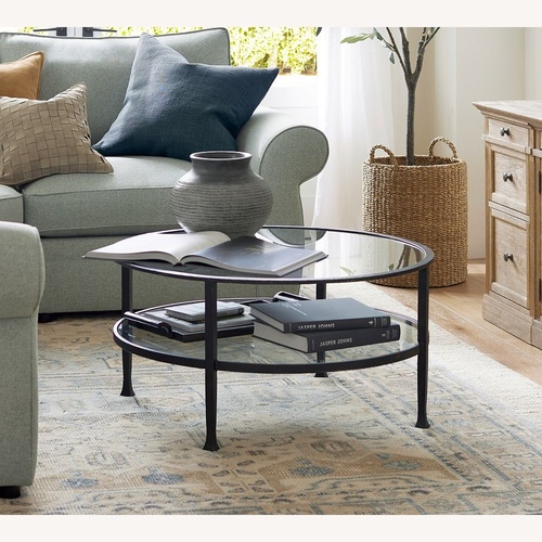 Used Pottery Barn Tanner Glass Top Coffee Table for sale on AptDeco
