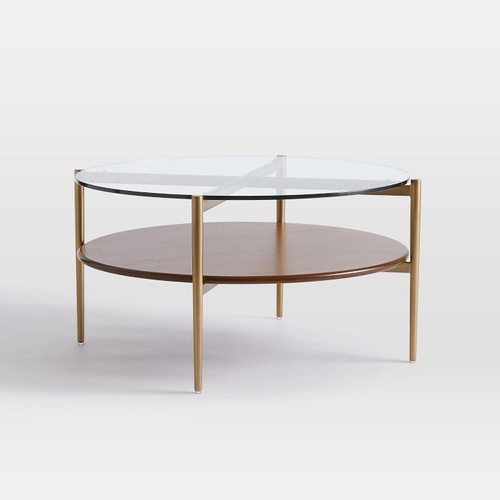 Used Mid-Century Art Display Round Coffee Table 34" for sale on AptDeco