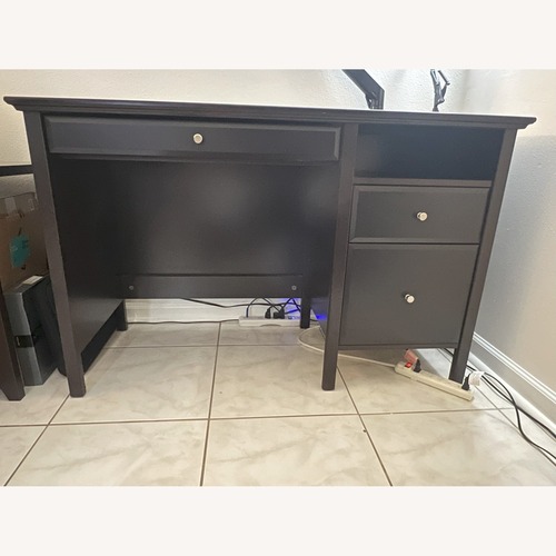 Used Sturdy Wood Desk with Ample Storage for sale on AptDeco