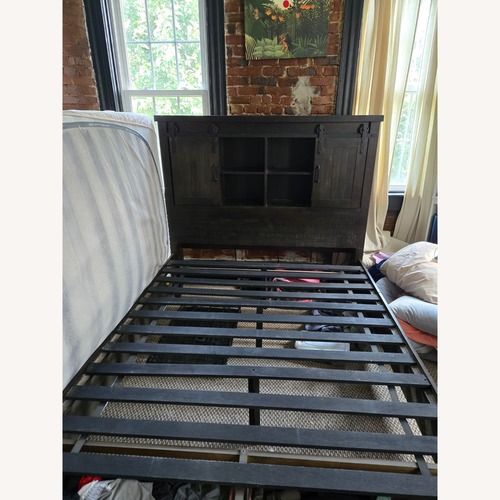 Used Montana Queen Brown Bookcase Storage Bed for sale on AptDeco