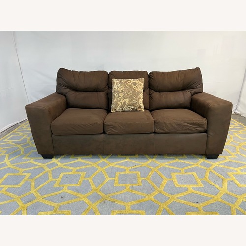 Used Ashley Furniture Navi Sofa - Chestnut for sale on AptDeco