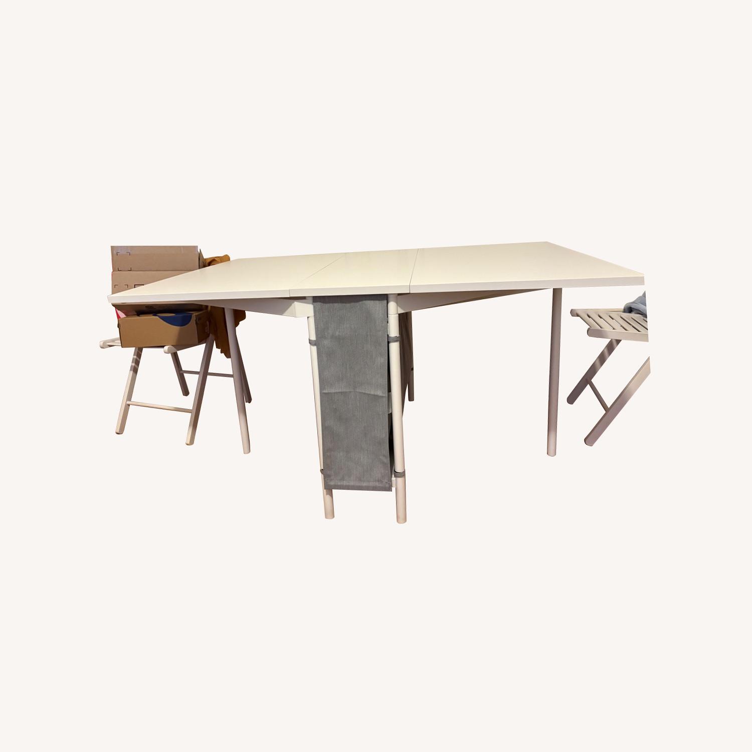 IKEA Extendable White Table with Chairs - image-0
