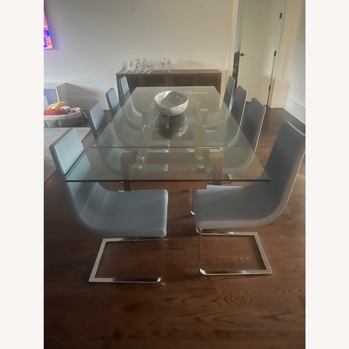 Used Calligaris Dining Table With 8 Chairs for sale on AptDeco