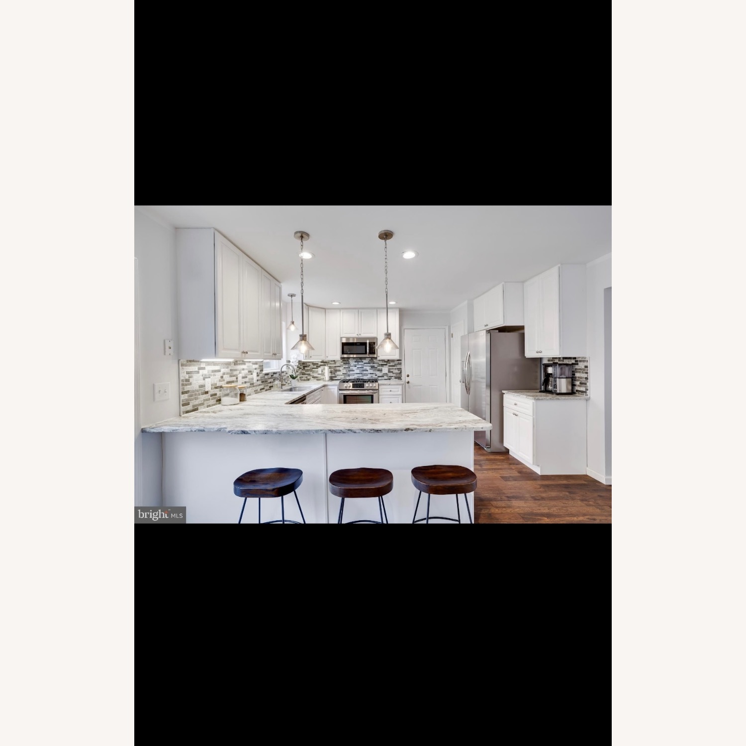 Leemington 24 inch Saddle Counter Height Stool - image-1