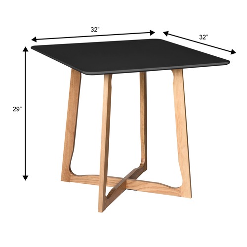 Used Cedar Square Black MDF Wood Accent Dining Table for sale on AptDeco