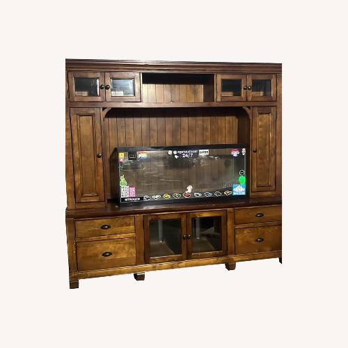 Used Wood Entertainment Center for sale on AptDeco
