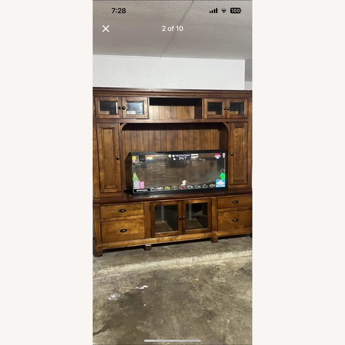 Used Wood Entertainment Center for sale on AptDeco