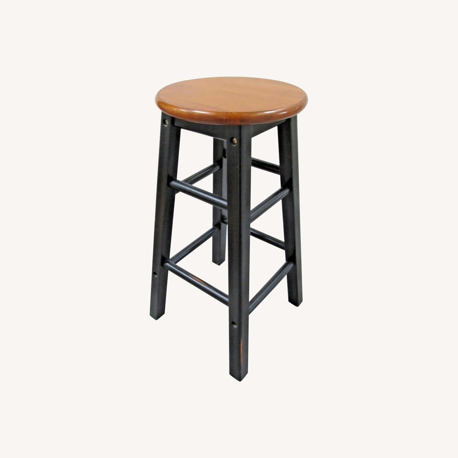Matched Pair of World Market Black Counter Stools - image-0