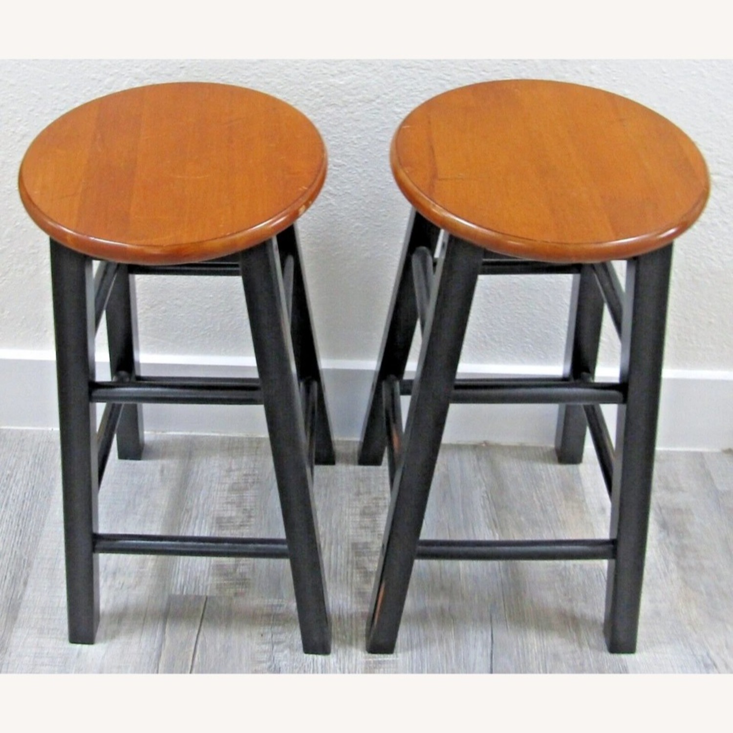 Matched Pair of World Market Black Counter Stools - image-1