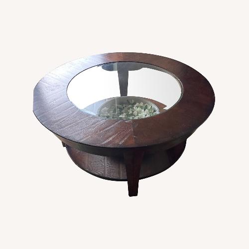 Used Kincaid Round Genuine Wood Cocktail Table for sale on AptDeco