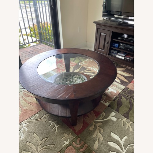 Used Kincaid Round Genuine Wood Cocktail Table for sale on AptDeco