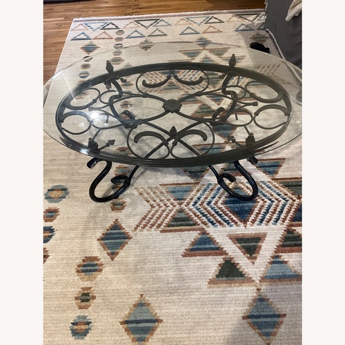 Used Wrought Iron Glass Coffee Table for sale on AptDeco