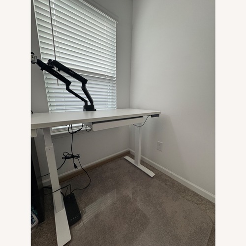 Used Motion Wise Electric Height Adjustable Desk for sale on AptDeco