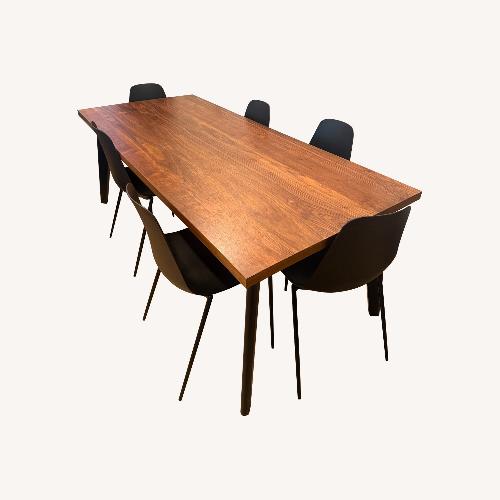 Used Harper Black Dining Table with Walnut Top for sale on AptDeco