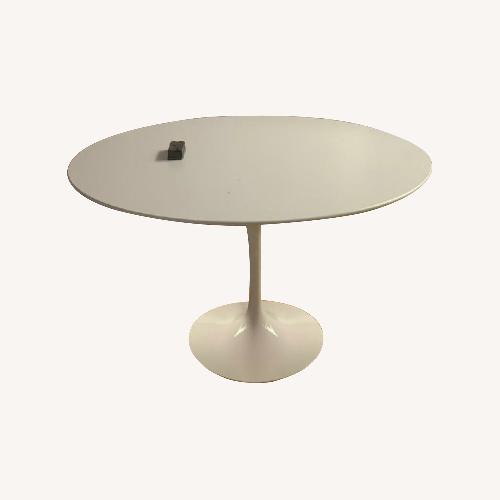 Used Eero Saarinen Round Dining Table for sale on AptDeco