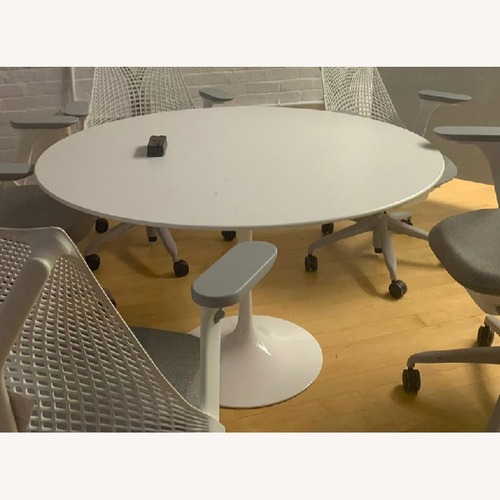 Used Eero Saarinen Round Dining Table for sale on AptDeco