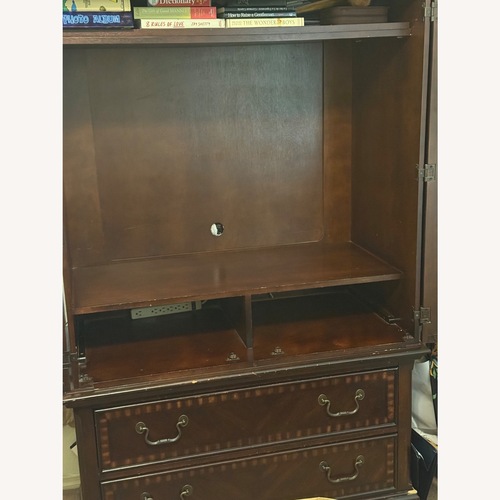Used Dark Brown Armoire for sale on AptDeco