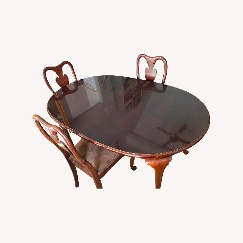 Used Dark Wood Dining Table 18in Leaf, and 6 Chairs for sale on AptDeco