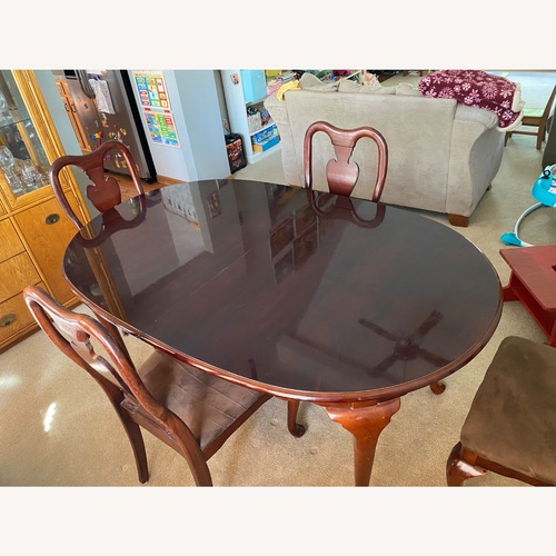 Used Dark Wood Dining Table 18in Leaf, and 6 Chairs for sale on AptDeco