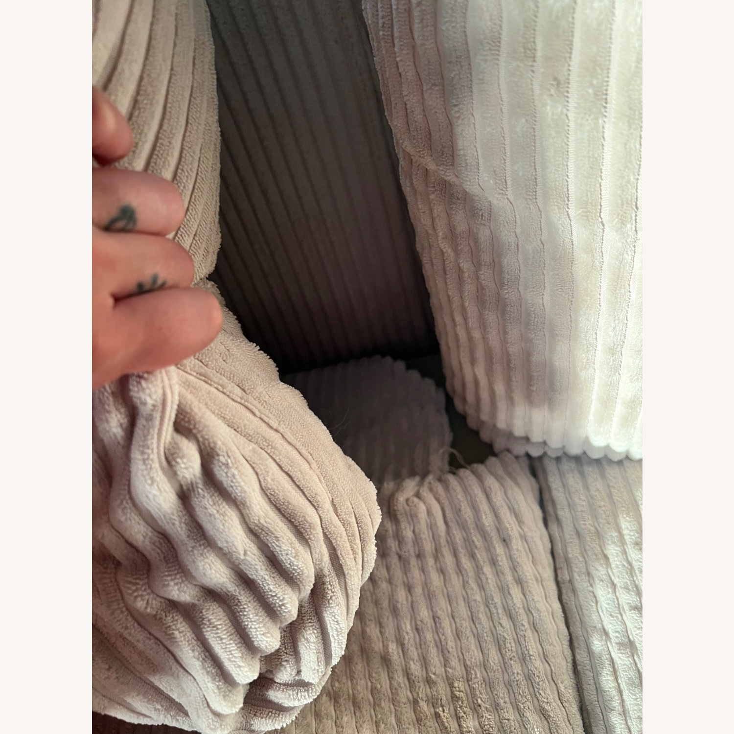 Annai 129" Wide Reversible Modular Corner Sectional with Ottoman - image-3