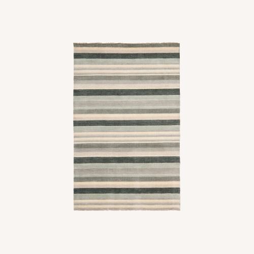 Used Safavieh Tibetan Stripe Rug for sale on AptDeco