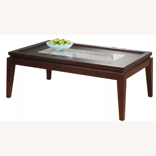 Used Rooms To Go Spiga Wood Coffee Table for sale on AptDeco