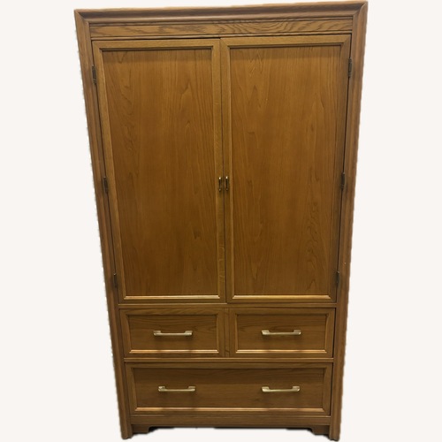 Used Mid-Century Wooden Armoire with Brass Hardware for sale on AptDeco