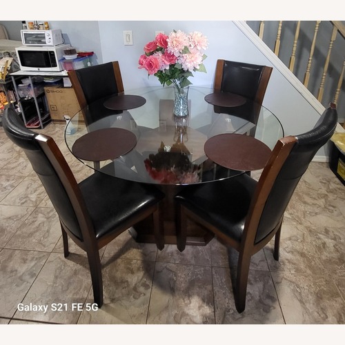 Used Dark Brown Wood Dining Set for sale on AptDeco