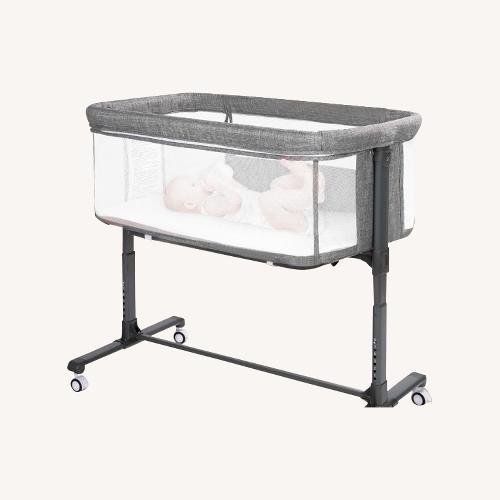 Used Light Gray Fabric Crib for sale on AptDeco