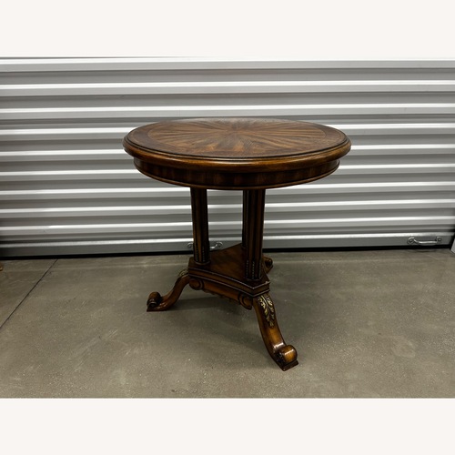 Used Traditional Round Accent Table with Carved Details for sale on AptDeco