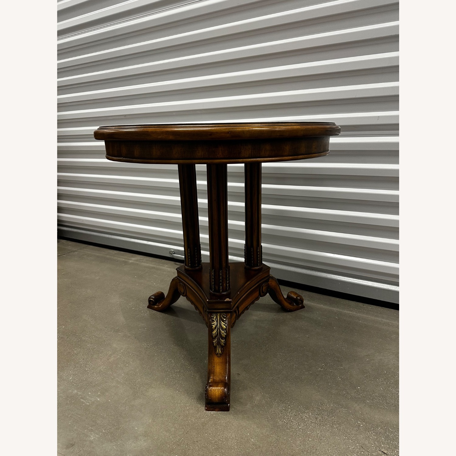 Traditional Round Accent Table with Carved Details - image-1