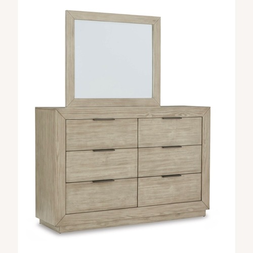 Used Ashley Furniture Hennington 6 Dresser with Mirror for sale on AptDeco