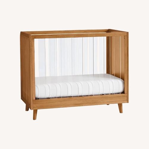 Used Pottery Barn Sloan Acrylic Crib for sale on AptDeco