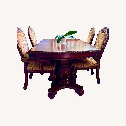 Used Extendable & Shortening Wooden Dining Table Set for sale on AptDeco