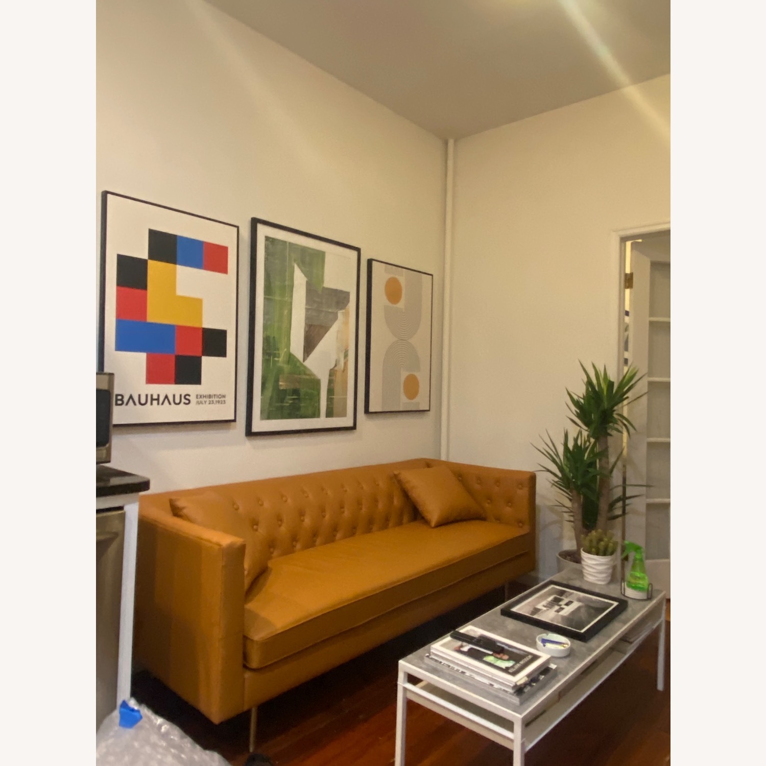 AllModern Gold Faux Leather Sleeper Sofa - image-1