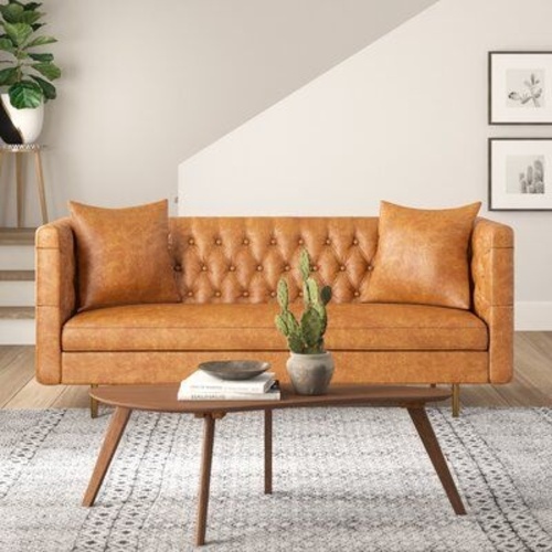 Used AllModern Gold Faux Leather Sleeper Sofa for sale on AptDeco