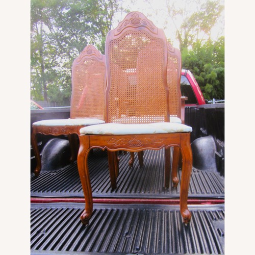 Used Vintage 6 Wood Dining Chairs with Floral Seat for sale on AptDeco