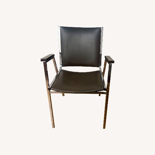 Used Hercules Series Heavy Duty Stack Chair with Arms for sale on AptDeco