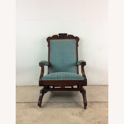 Used Antique Upholstered Rocking Chair with Carved Wood for sale on AptDeco