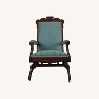 Antique Upholstered Rocking Chair with Carved Wood