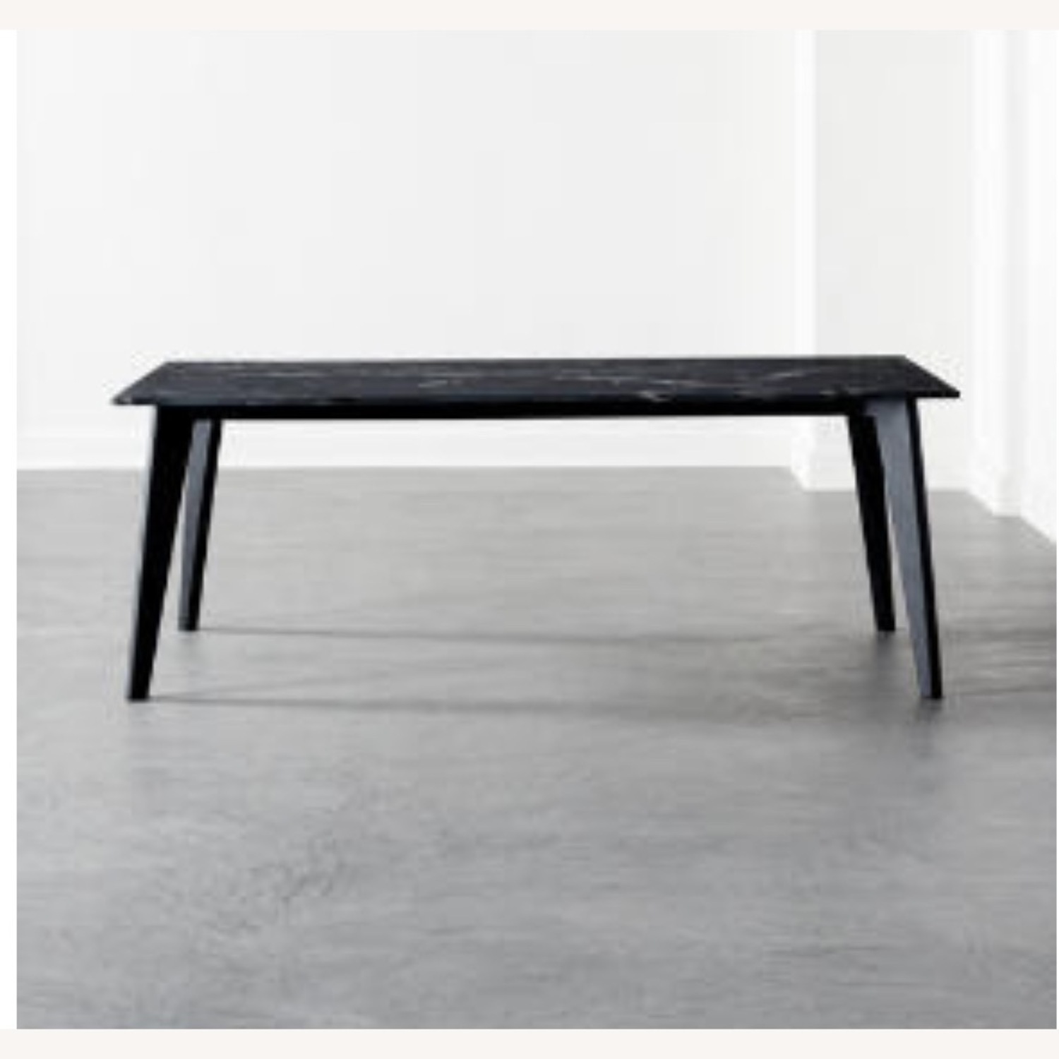 CB2 Harper Black Dining Table with Black Marble Top. - image-1